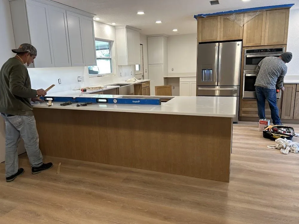Kitchen remodeling installation in progress.