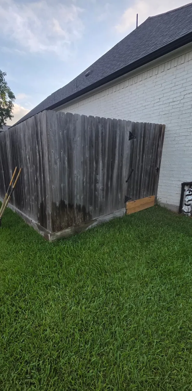 Existing fence conditions documented before the Composite Picket fence installation.