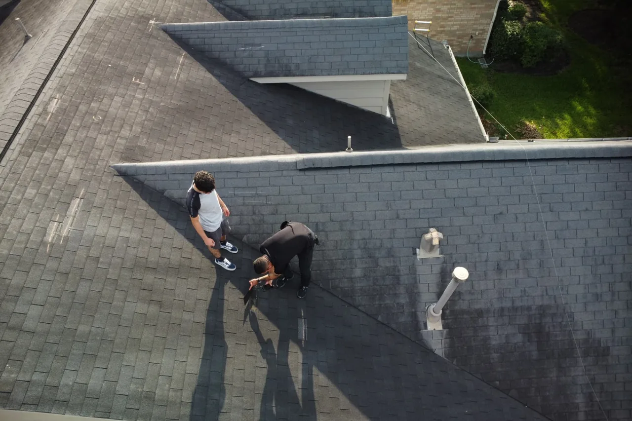E Torres Solutions performing a roof and property condition inspection