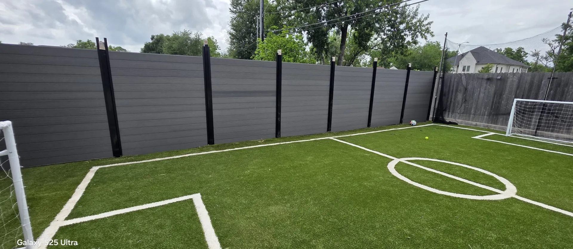 Completed Composite Picket fence project by E Torres Solutions.