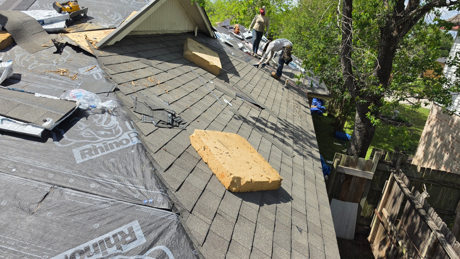 Roof replacement work photographed on site