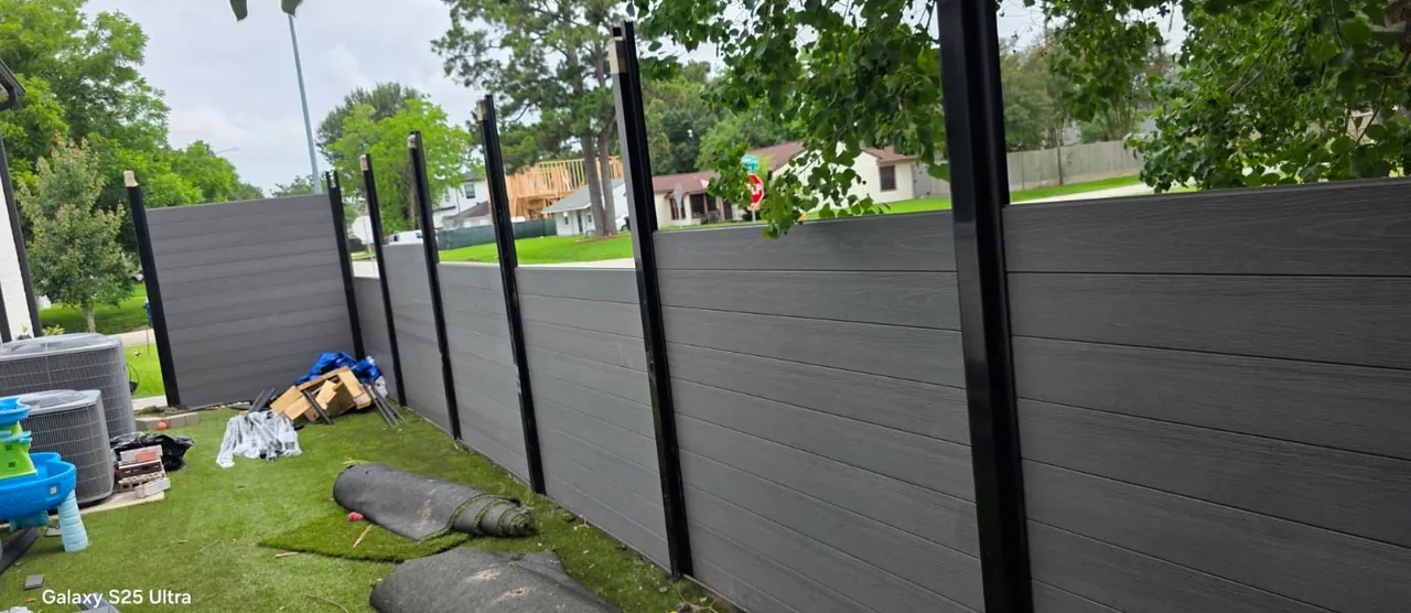Post structure and Composite Picket panel installation in progress.