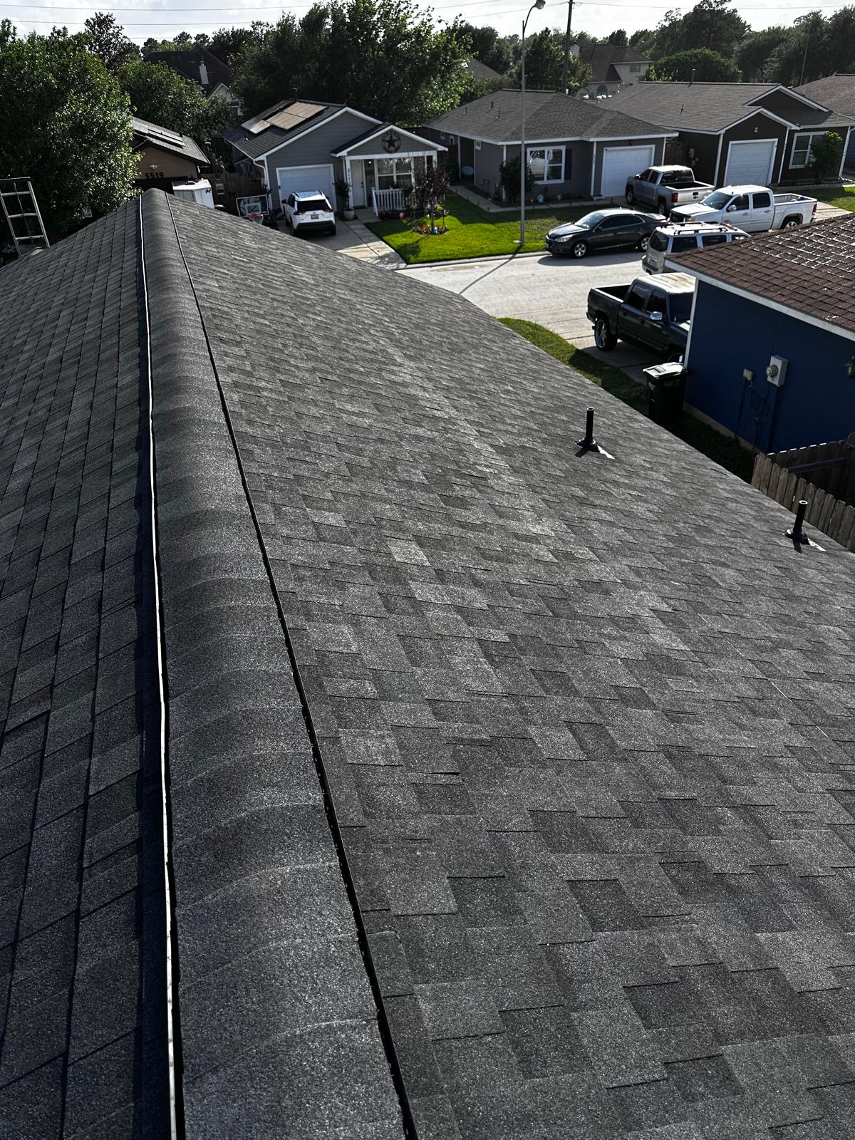 Aerial view of roofing work in progress