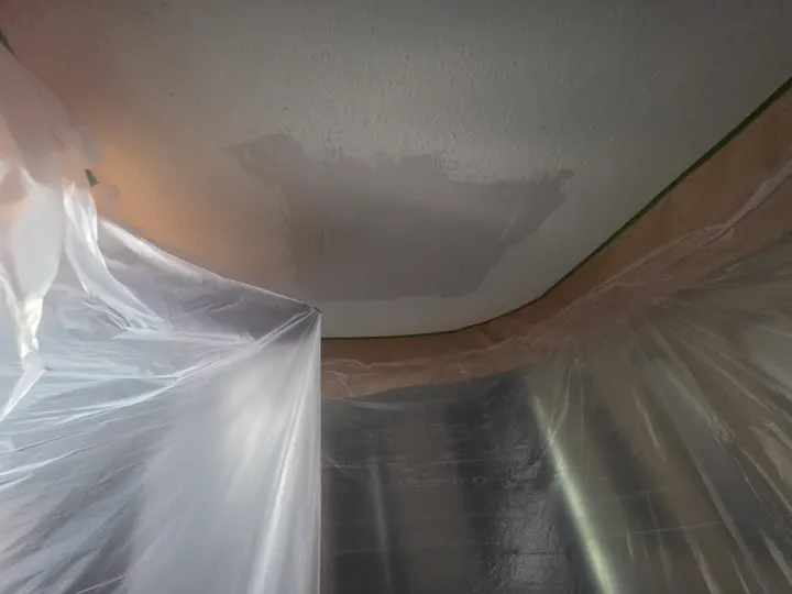 E Torres Solutions interior ceiling repair work in progress