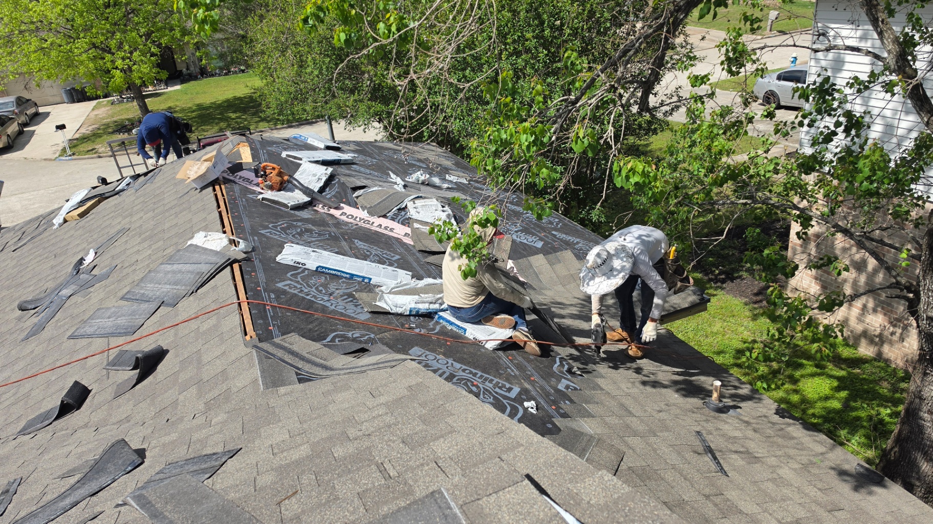 Roofing installation activity photographed on site